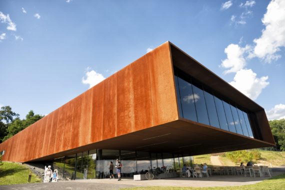 The museum and research center of the Celtic culture. The museum was opened in 2011 by the Hessen office of built heritage conservation ( Landesamt fȕr Denkmalpflege Hessen). It is located at the important place of discovery of a Celtic settlement aged about 5 thousend B.C. In the front of the building you see visitors watching and enjoing at the location.